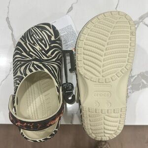 NMT animal print crocs. Daughter outgrew before we used.